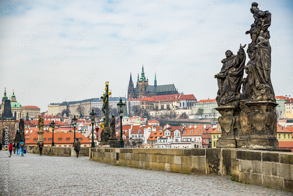 Obraz premium Prague, Czech republic - March 19, 2020. Charles Bridge without tourist during Covid-19 travel ban