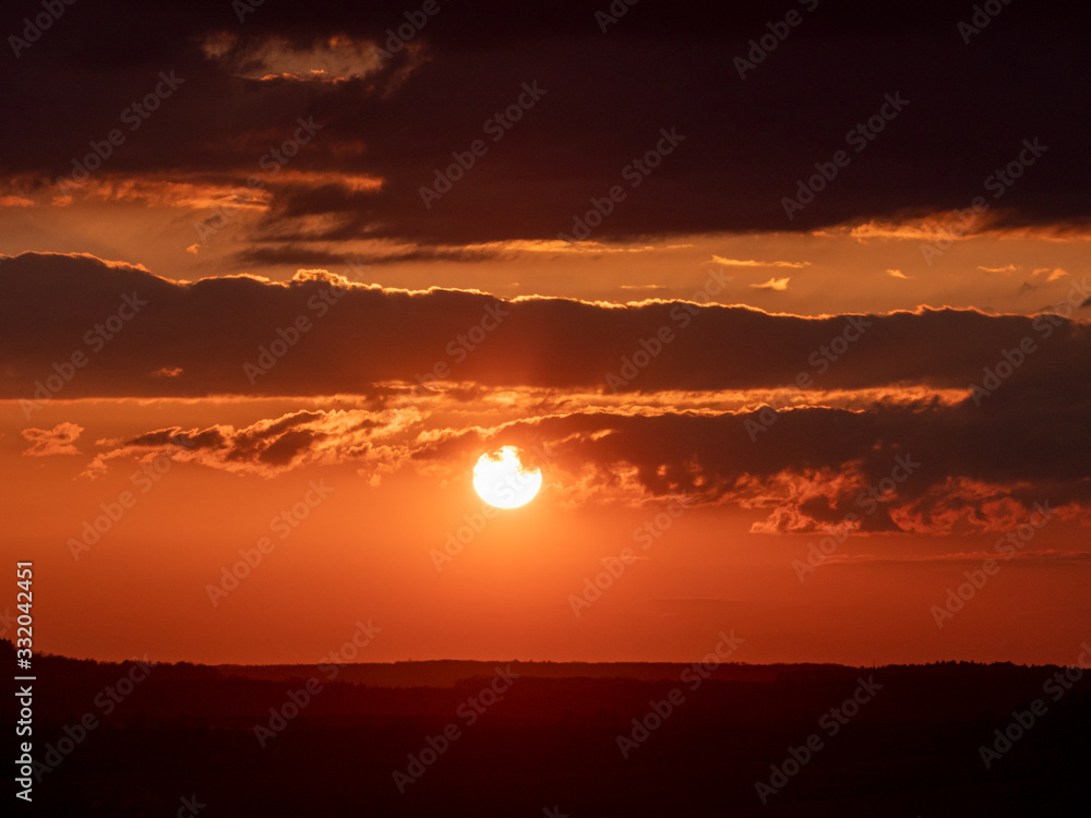 Beautiful nightly sunset with many clouds in the sky. Beautiful nightly sunset with many clouds in the sky.