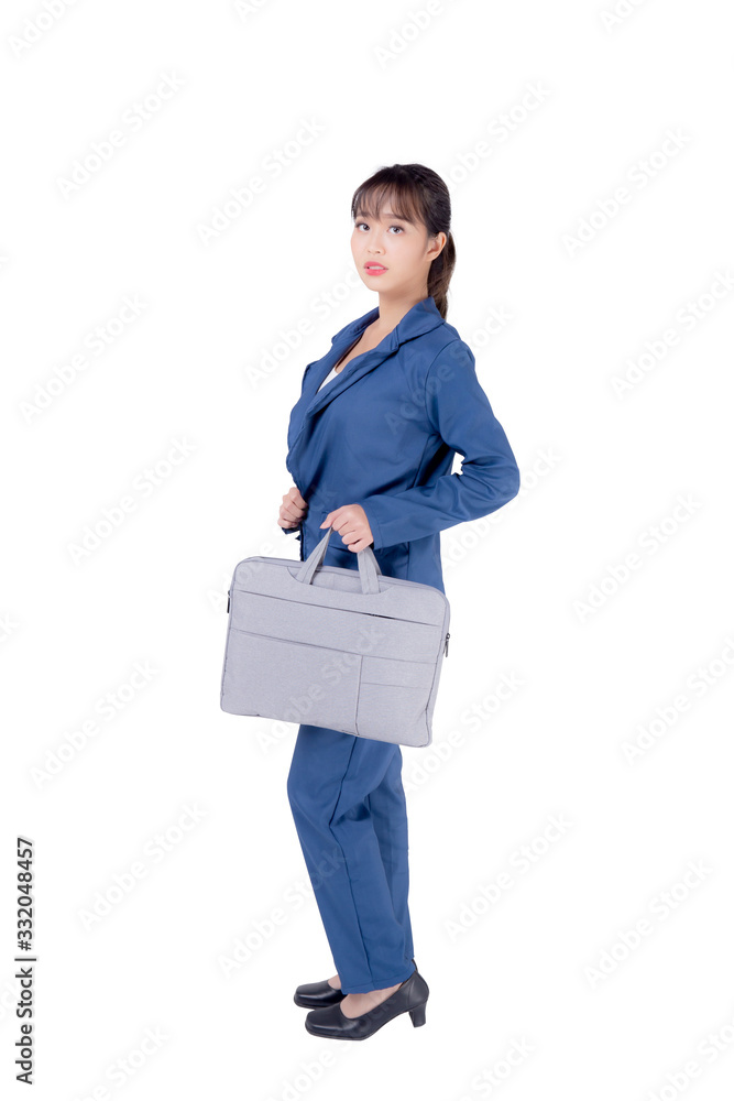 Beautiful portrait young business asian woman holding a briefcase portfolio isolated on white background, confident businesswoman walking and carrying document case of work, employee girl is cheerful. Beautiful portrait young business asian woman holding a briefcase portfolio isolated on white background, confident businesswoman walking and carrying document case of work, employee girl is cheerful.