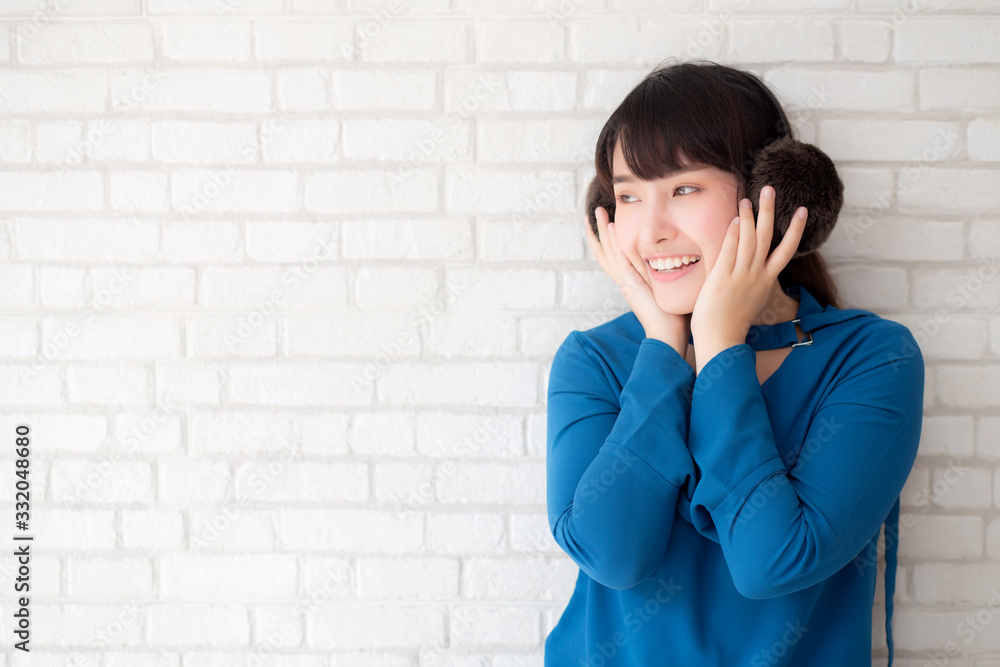 Portrait of beautiful young asian woman enjoy and happiness standing on gray cement texture grunge wall brick background, girl is a smiling and cheerful on concrete. Portrait of beautiful young asian woman enjoy and happiness standing on gray cement texture grunge wall brick background, girl is a smiling and cheerful on concrete.