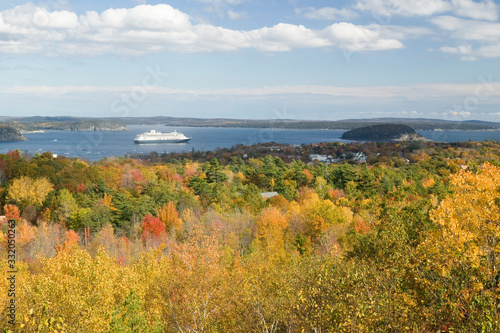 Autumn view from 1530 foot high Cadillac Mountain with views of the Porcupine Islands, Frenchman Bay and Holland America cruise ship in harbor, Acadia national Park, Maine