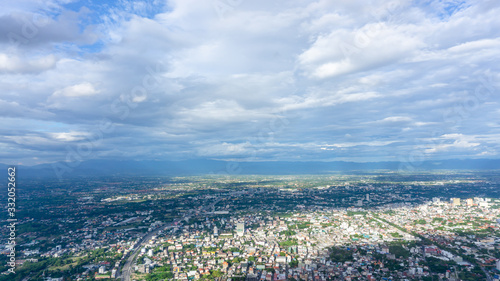 Fototapeta Naklejka Na Ścianę i Meble -  Skyscape view from clear glass window seat from aircraft to cloudscape, traveling on white fluffy clouds and vivid blue sky above the earth in a sunny day
