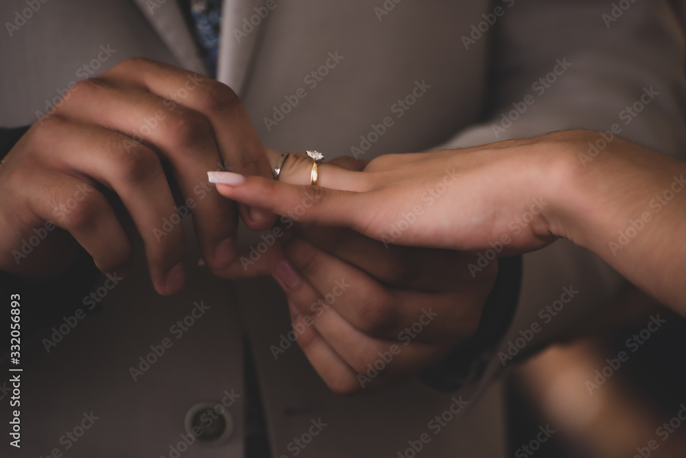 A wedding ring is a finger ring that indicates that its wearer is married
