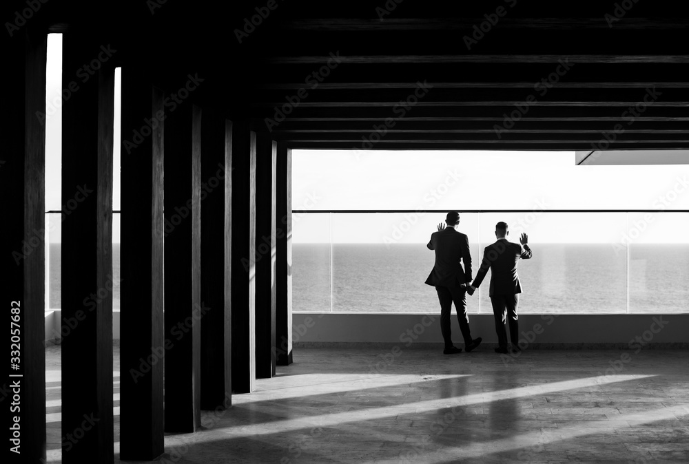 Romantic portrait of the silhouette of a couple on a beautiful sunset at the beach