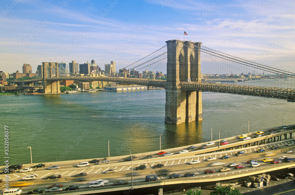 Fototapeta premium Long view of Brooklyn Bridge over East River to Brooklyn with FDR River, NY