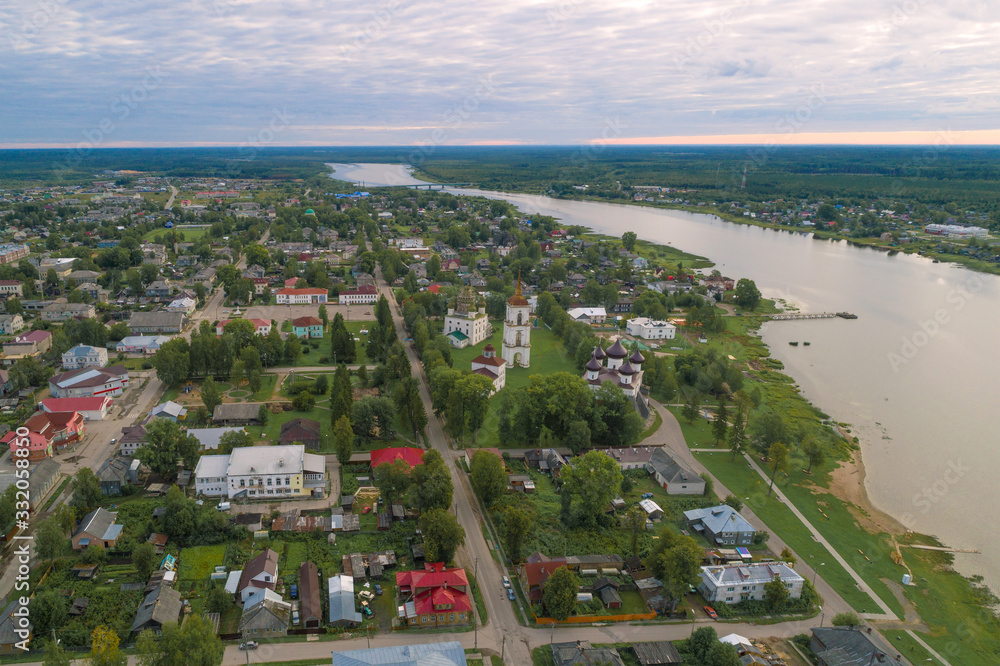 Fototapeta premium Aerial view of the ancient city of Kargopol on a cloudy summer morning. Arhangelsk region. Russia