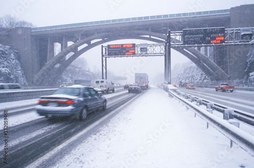 Cars in winter storm and fresh snow on Route 80/95 in Fort Lee New Jersey from New York City, NY