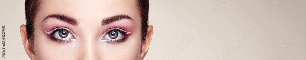 Female Eye with Extreme Long False Eyelashes. Eyelash Extensions. Makeup, Cosmetics, Beauty. Close up, Macro Female Eye with Extreme Long False Eyelashes. Eyelash Extensions. Makeup, Cosmetics, Beauty. Close up, Macro
