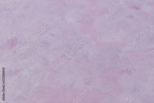 abstract textured painting or photography backdrop with pink and grey toned acrylic paint