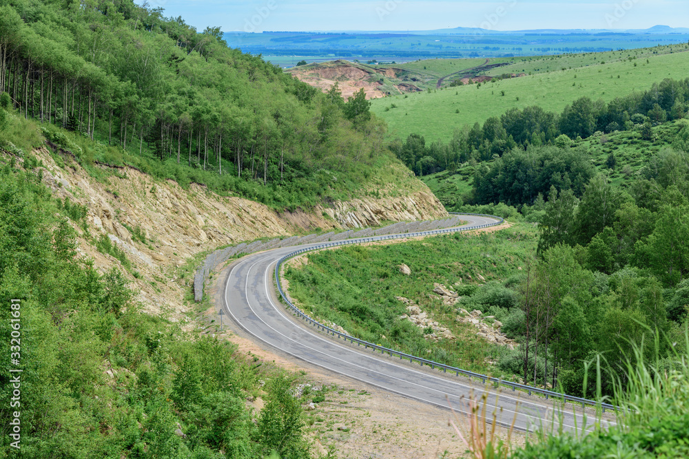 Serpentine road for cars in the rocky mountains. Serpentine road for cars in the rocky mountains.