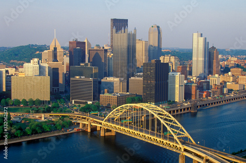 Fotografie Liberty Bridge over Monongahela River at sunset with Pittsburgh skyline, PA