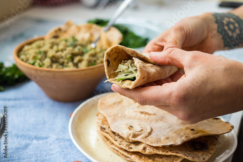 Tortilla, quesadilla, make flatbread stuffed. Put vegetables filling. Vegan, vegetarian healthy food