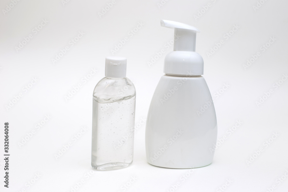 white background with a white bottle of antibacterial soap and bottle antibacterial gel for hands white background with a white bottle of antibacterial soap and bottle antibacterial gel for hands