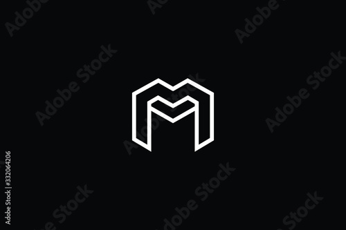 Minimal elegant monogram art logo. Outstanding professional trendy awesome artistic M MM initial based Alphabet icon logo. Premium Business logo White color on black background