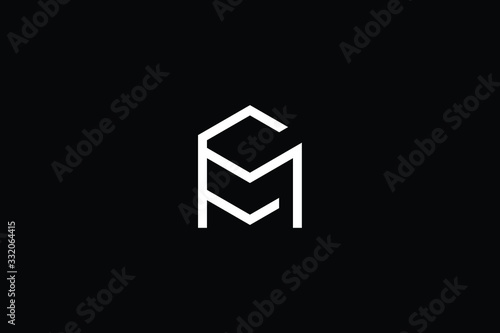 Minimal elegant monogram art logo. Outstanding professional trendy awesome artistic MC CM initial based Alphabet icon logo. Premium Business logo White color on black background