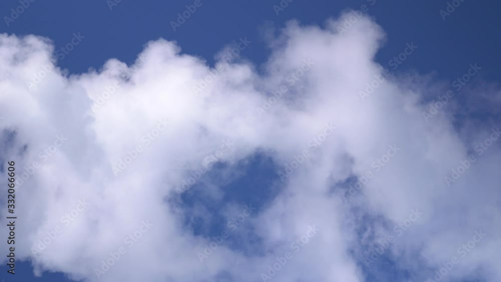 Smoke abstract. Smoke cloud. Smoke on blu background in sun light. Smoke effect. Studio shot. Fog background. Smoke abstract. Smoke cloud. Smoke on blu background in sun light. Smoke effect. Studio shot. Fog background.