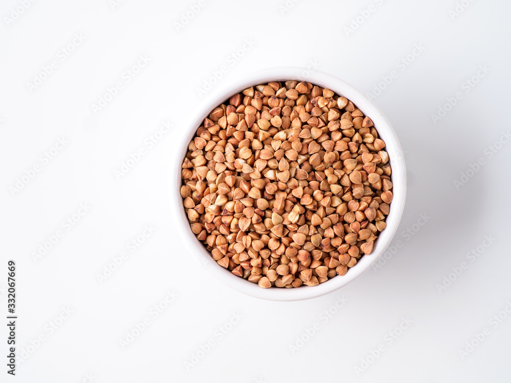 Plate with buckwheat isolated on white background. Plate with buckwheat isolated on white background.