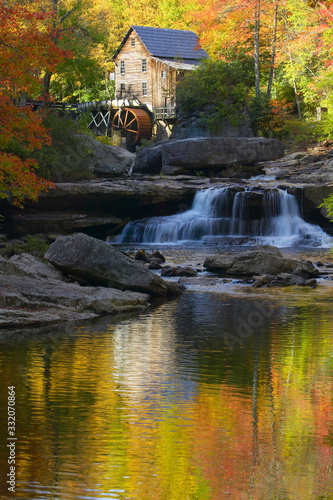 Glade Creek Grist Mil and autumn reflections and water fall in Babcock State Park  WV