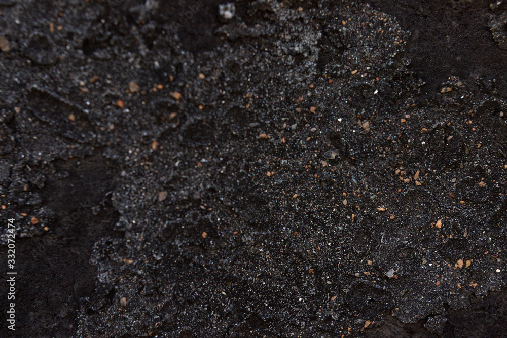 Old texture background close- up, black wall in resin. Backgrounds and textures Old texture background close- up, black wall in resin. Backgrounds and textures