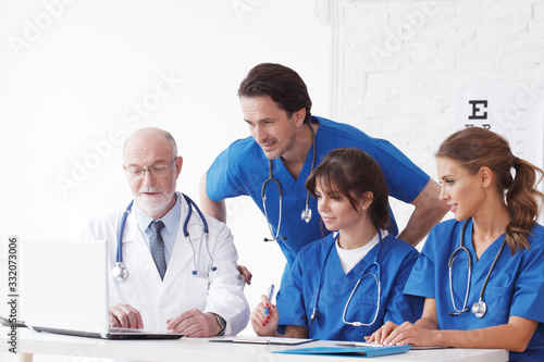 Medical doctor team at consultation photo