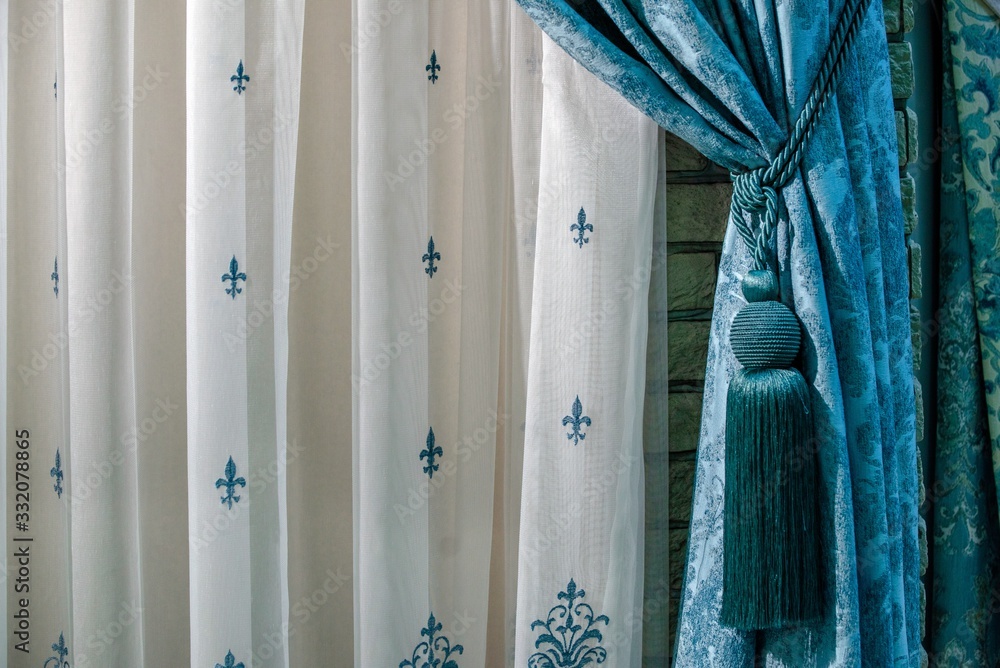 Blue and white curtains against the wall Blue and white curtains against the wall