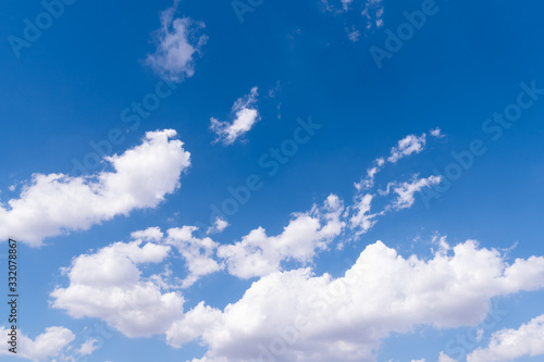 The blue sky with moving white clouds. The most of clouds are beautiful color and shade, suitable for use as background image. © 3asy60lf