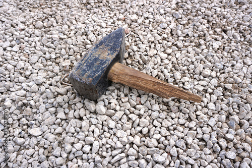 old broken useless hammer