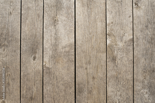 background with wooden boards, background with gray wood planks, background with vertical trees gray boards, photo of a table made of vertical trees with unpolished boards