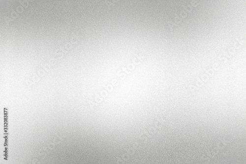 Glowing silver foil glitter metal sheet with copy space, wallpaper texture background