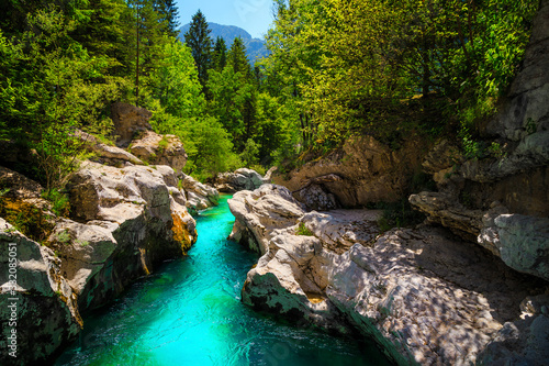 Emerald color Soca river with beautiful narrow canyon, Bovec, Slovenia photo