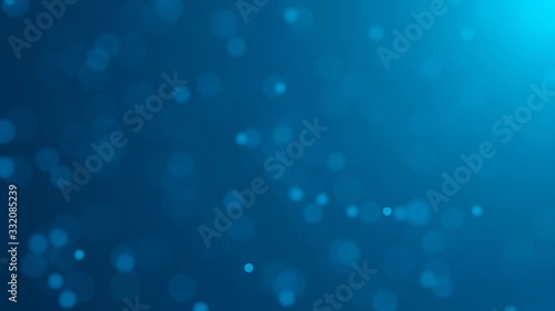 Abstract blue defocused particles slowly moving on blue background, loopable