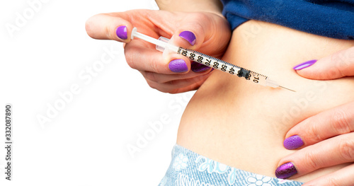 Diabetes patient make insulin shot by syringe. Woman use Insulin injection pen. Diabetes medical care. Dependent diabetes woman make a subcutaneous injection by syringe.