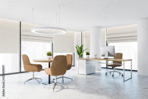 White CEO office with columns and round table