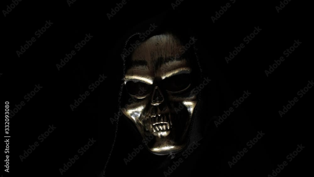 Man in a skeleton mask in the dark Man in a skeleton mask in the dark