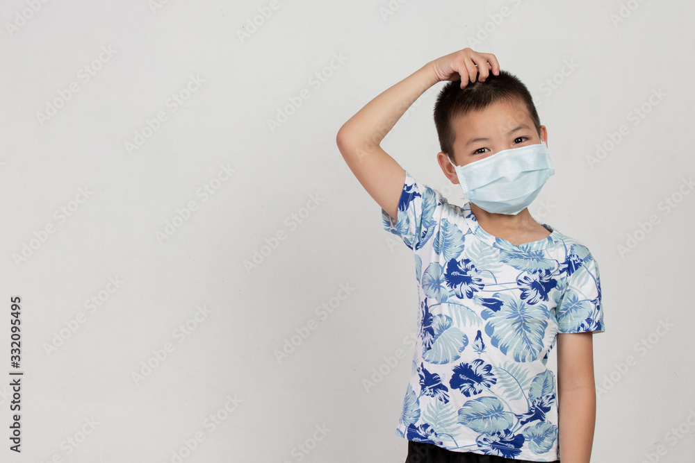 boy with mask acting on white background