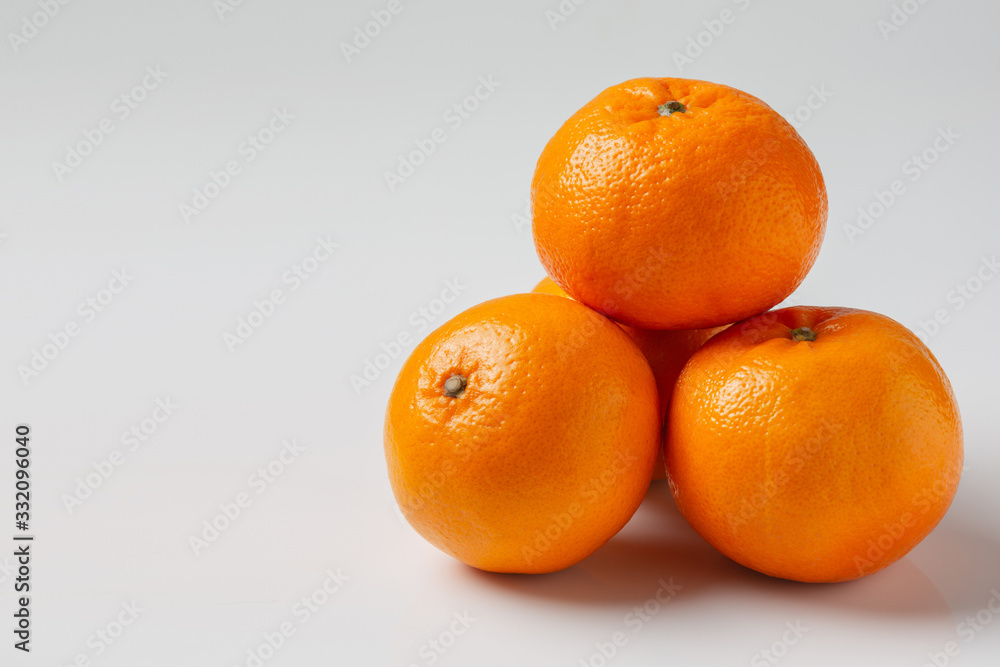 Fresh oranges on a white background Fresh oranges on a white background