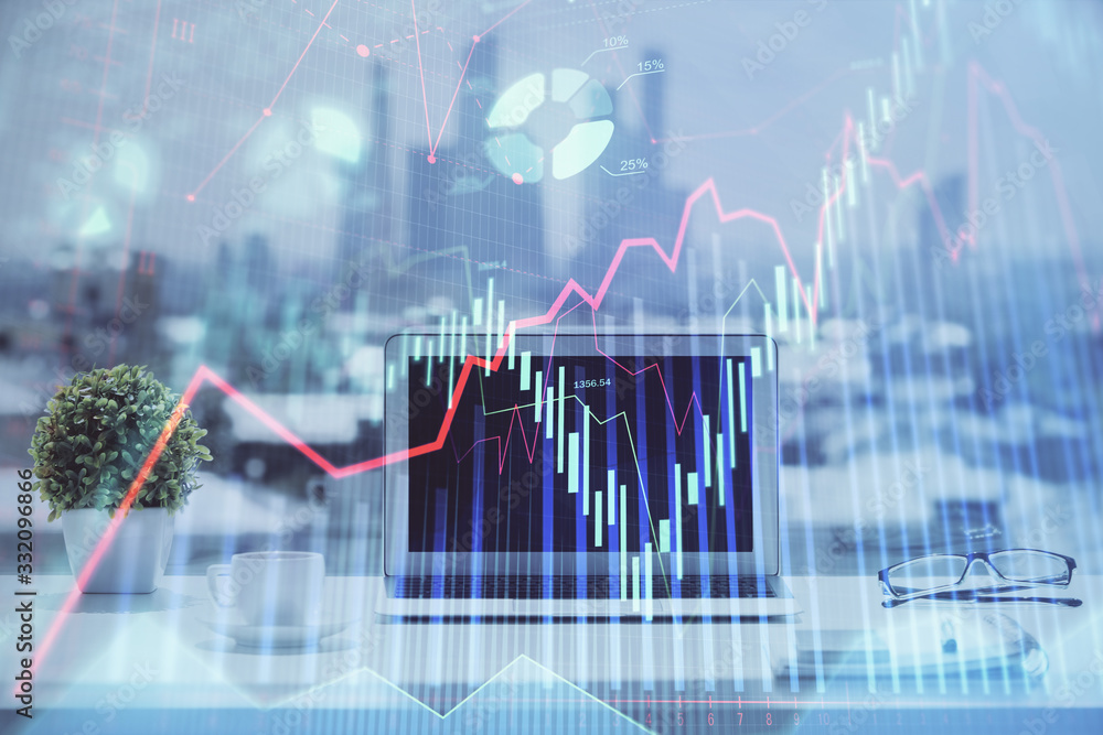 Forex graph hologram on table with computer background. Multi exposure. Concept of financial markets. Forex graph hologram on table with computer background. Multi exposure. Concept of financial markets.