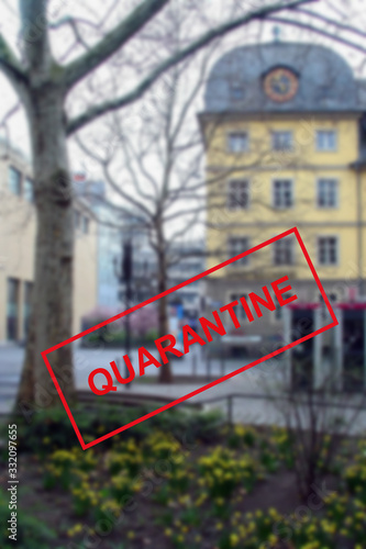 Coronavirus quarantine in Europe. Text against the background of spring city streets in Bonn in Germany.