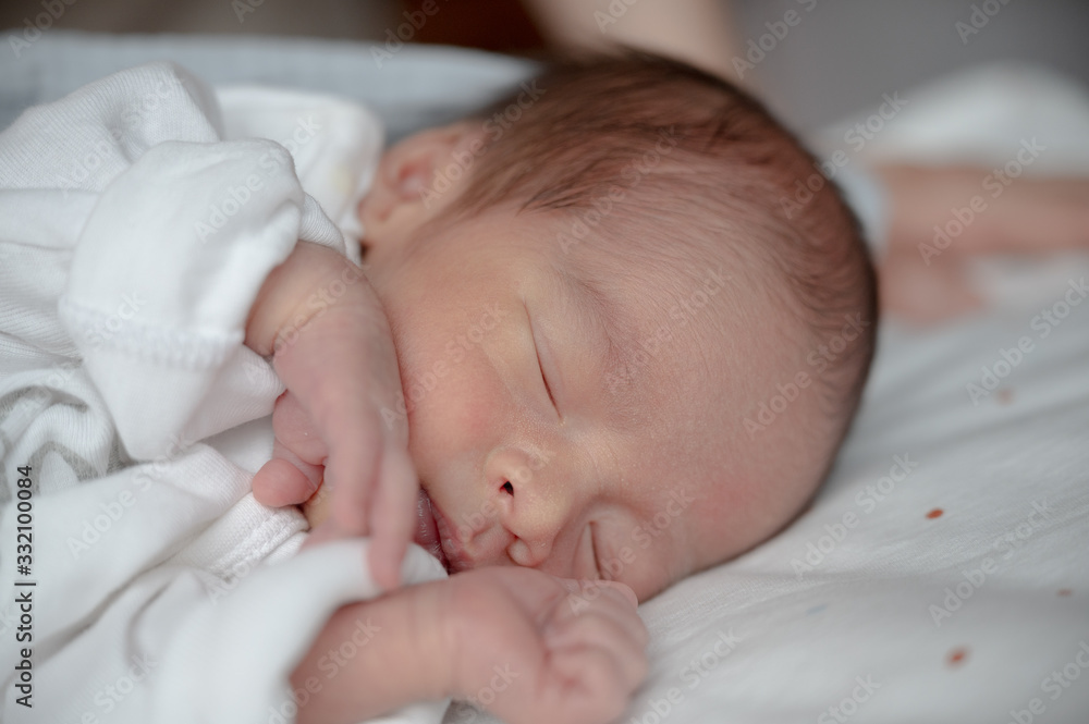 Newborn baby sleeping on bed.Family and love concept.Asian kid. Newborn baby sleeping on bed.Family and love concept.Asian kid.
