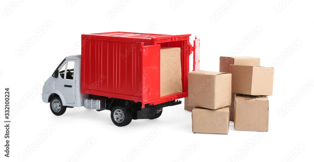 Truck model and carton boxes on white background. Courier service Truck model and carton boxes on white background. Courier service