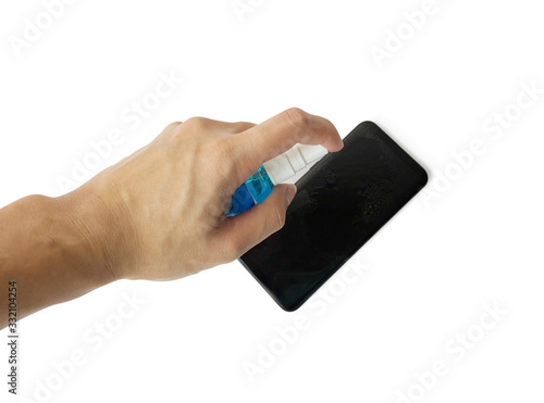 The hand that holds the alcohol bottle and injects it into the phone