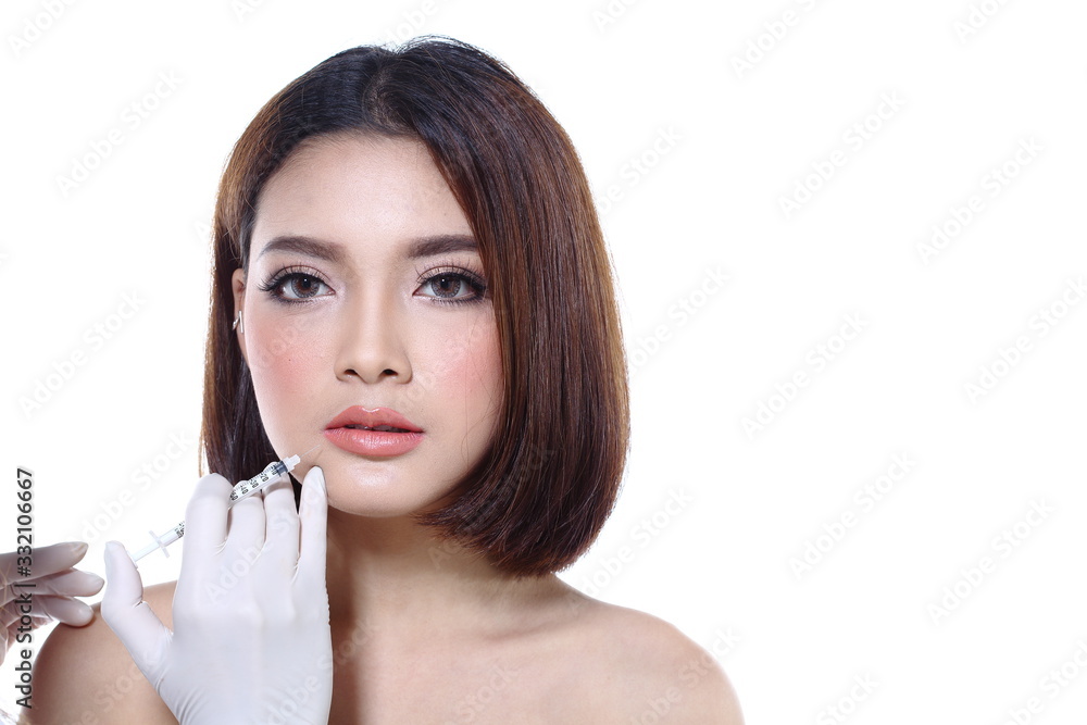 Beautiful Asian woman want to check eye, nose, eyebrow, forehead, cheek, jawline before plastic surgery, studio lighting white background copy space for text logo Beautiful Asian woman want to check eye, nose, eyebrow, forehead, cheek, jawline before plastic surgery, studio lighting white background copy space for text logo