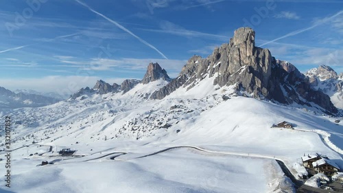 Wide epic winter landscape in the Alps. Aerial of dolomites on passo giau in 4K