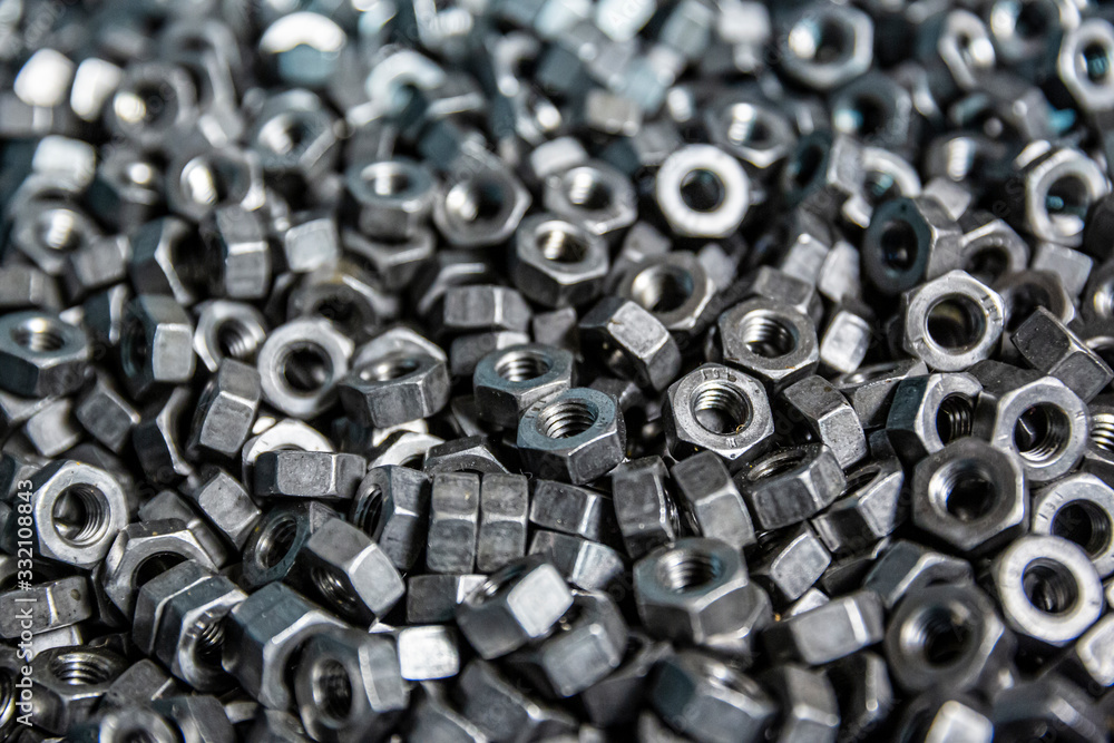 Stainless Steel Nuts. Bolt and Nut in metal. Stainless Steel Nuts. Bolt and Nut in metal.
