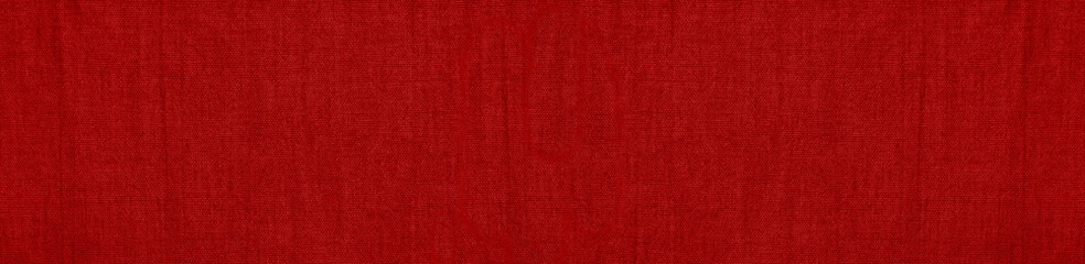 Abstract red background. Texture of natural cotton fabric. Red banner with copy space for your design.