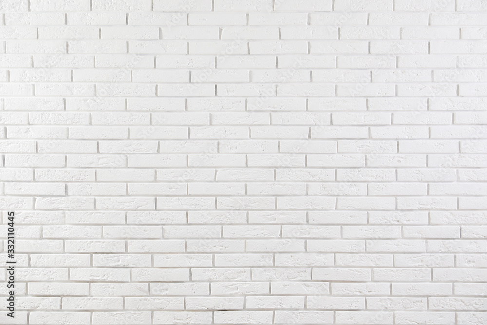 Obraz premium White brick wall as background. Simple design