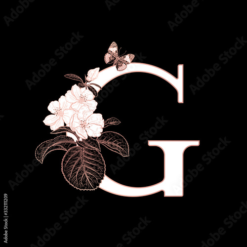 Decorations with letter G, flowering sakura branches and butterfly.