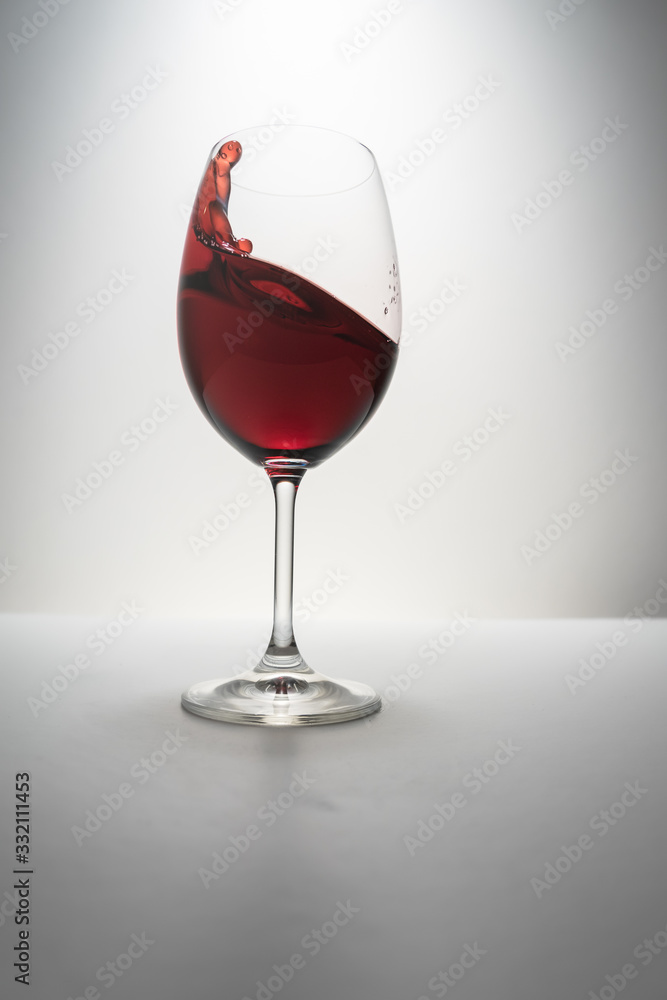 red wine splash in glass red wine splash in glass