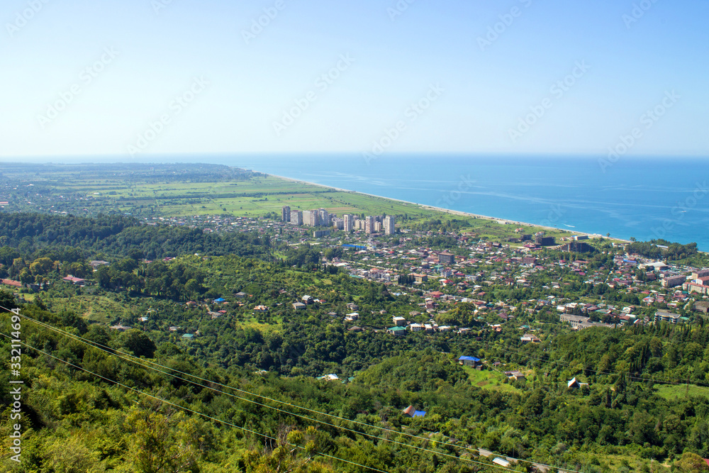 Fototapeta premium Summer landscape in the mountains and dark blue sky with clouds