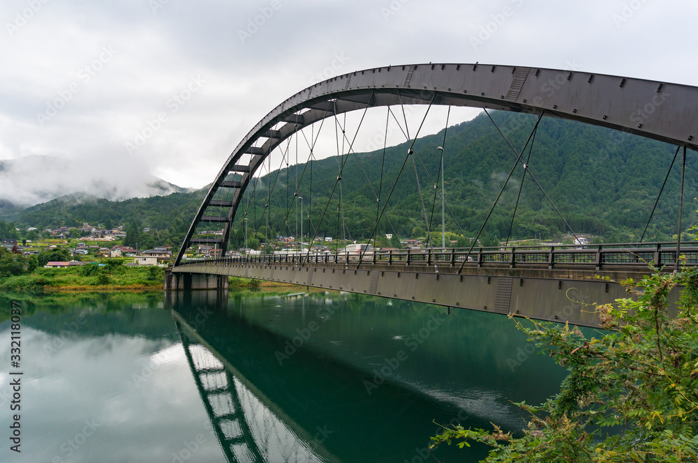 Obraz premium Bridge steel frame with asphalt road. Bridge in Japanese countryside